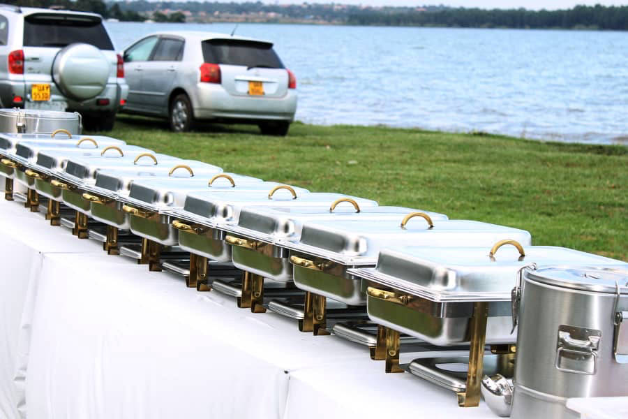 Buffet catering set up beside Lake Victoria for an event