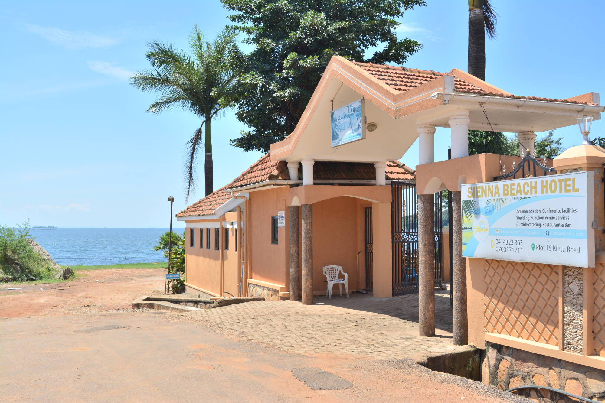 Sienna Beach Hotel's lakeside entrance gate and signage